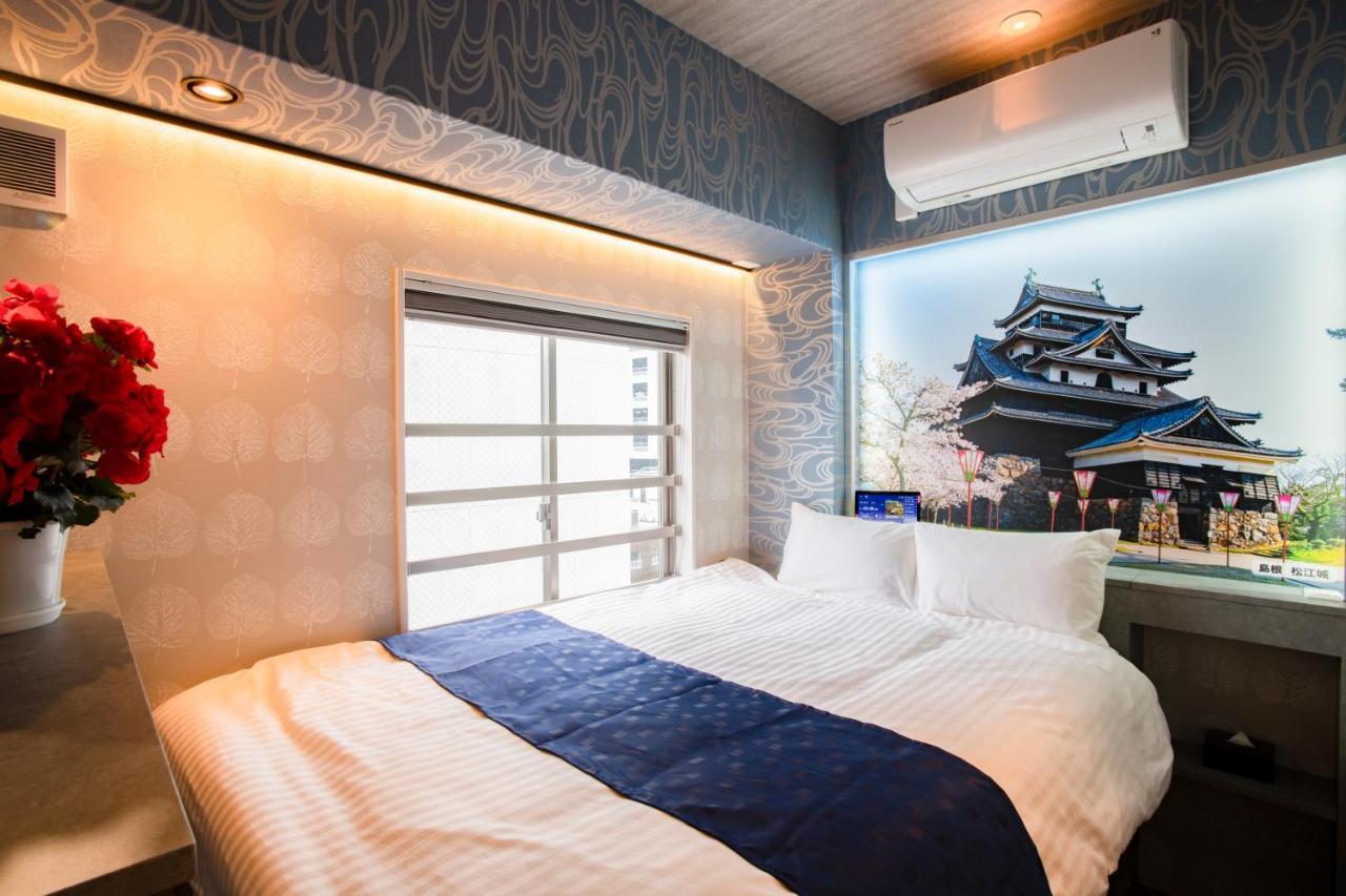 Hotel Xcell Hiroshima Nagarekawa Bagian luar foto