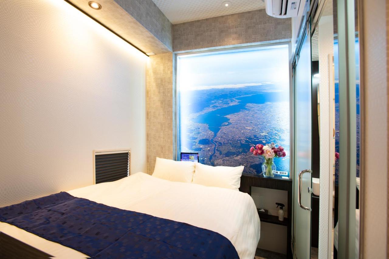 Hotel Xcell Hiroshima Nagarekawa Bagian luar foto