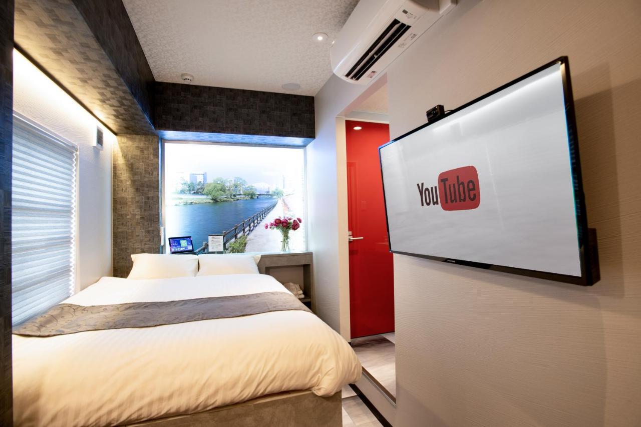 Hotel Xcell Hiroshima Nagarekawa Bagian luar foto