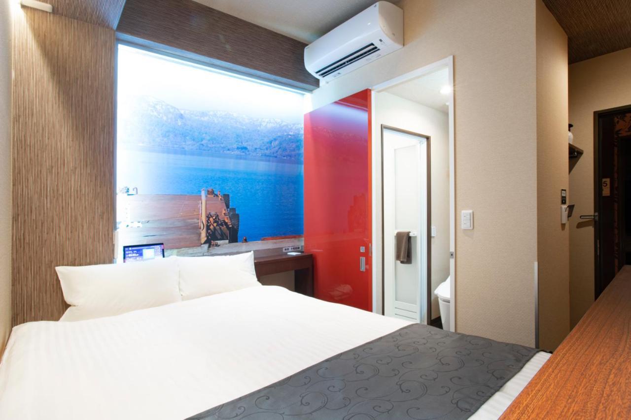 Hotel Xcell Hiroshima Nagarekawa Bagian luar foto