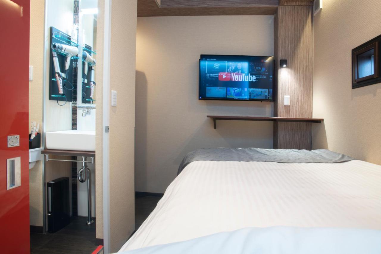 Hotel Xcell Hiroshima Nagarekawa Bagian luar foto